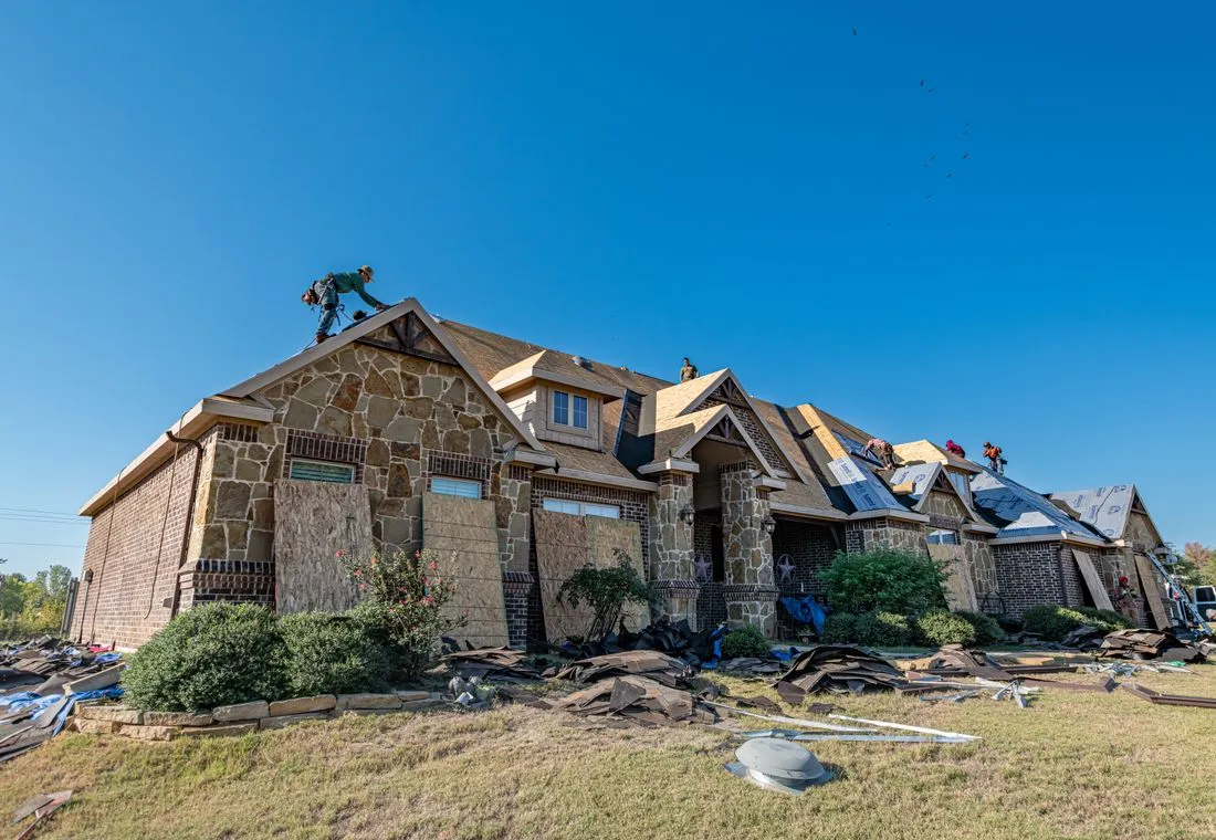 New shingle roof being installed on a Texas home
