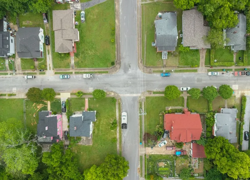 Established tree-lined residential streets typical of Bellaire Town Square area in Bellaire